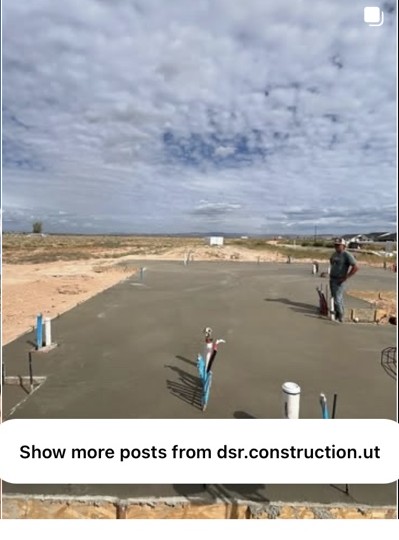 Fresh concrete slab with plumbing rough-ins